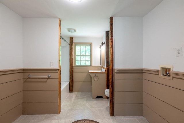 15 Feylers Corner Rd, Waldoboro, ME 04572 - full bathroom featuring a wainscoted wall and shower / tub combo