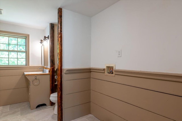 15 Feylers Corner Rd, Waldoboro, ME 04572 - bathroom featuring vanity, wainscoting, and tile patterned floors