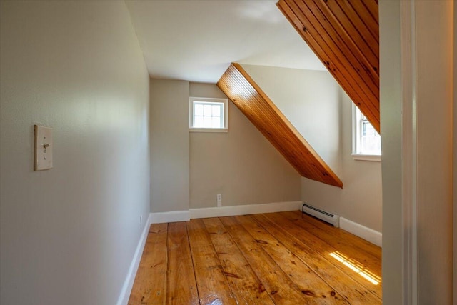 15 Feylers Corner Rd, Waldoboro, ME 04572 - bonus room featuring a baseboard radiator, hardwood / wood-style flooring, and lofted ceiling