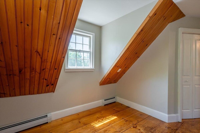 15 Feylers Corner Rd, Waldoboro, ME 04572 - bonus room with a baseboard heating unit, light wood-style floors, and vaulted ceiling