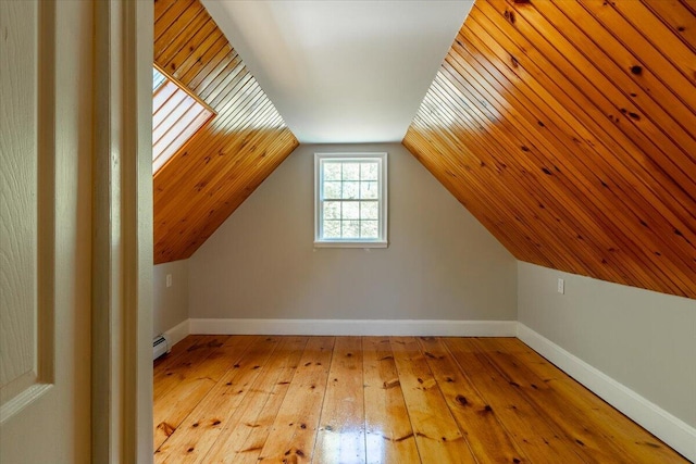 15 Feylers Corner Rd, Waldoboro, ME 04572 - bonus room featuring hardwood / wood-style floors, a baseboard radiator, and vaulted ceiling