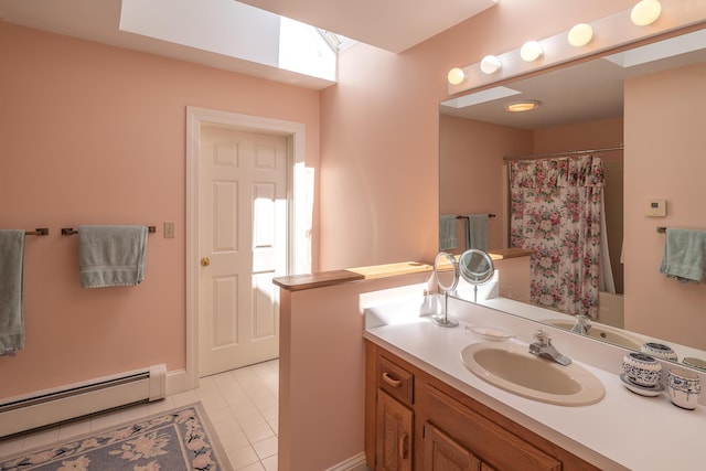 4 Roland Kimball Rd Unit 2, Freeport, ME 04032 - bathroom with baseboard heating, vanity, tile patterned flooring, and a shower with curtain