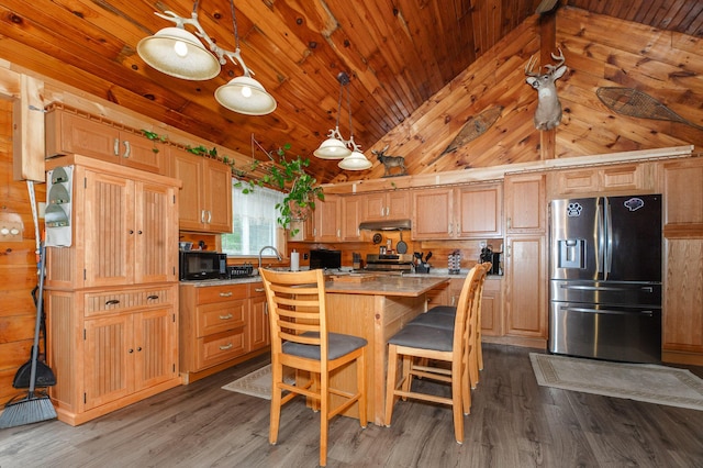 15 Doe Cir, Bingham, ME 04920 - kitchen featuring stainless steel appliances, under cabinet range hood, a center island, dark wood-style flooring, and wood ceiling