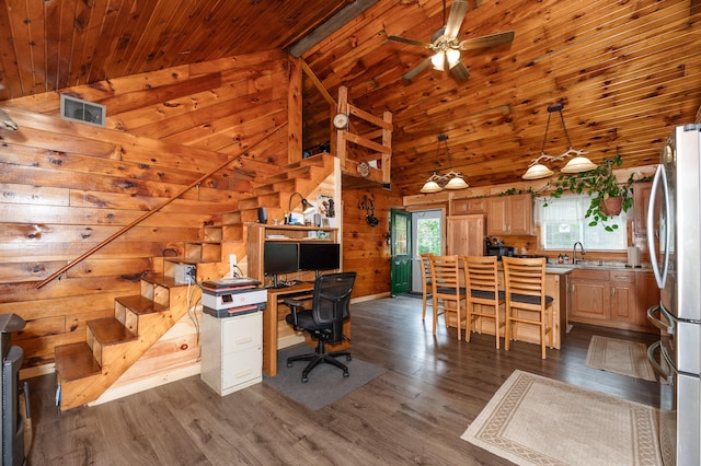 15 Doe Cir, Bingham, ME 04920 - office area featuring a ceiling fan, dark wood finished floors, a sink, wood ceiling, and wooden walls