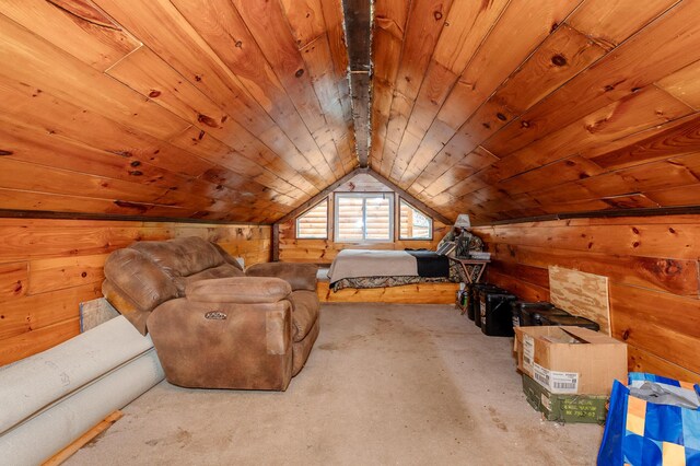 15 Doe Cir, Bingham, ME 04920 - living area featuring wooden walls, vaulted ceiling, wooden ceiling, and concrete floors