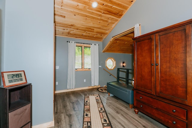 15 Doe Cir, Bingham, ME 04920 - sitting room featuring wood ceiling, wood finished floors, lofted ceiling, and baseboards