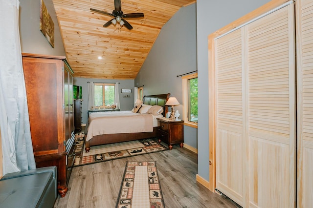 15 Doe Cir, Bingham, ME 04920 - bedroom with lofted ceiling, wooden ceiling, wood finished floors, and baseboards