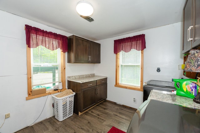 15 Doe Cir, Bingham, ME 04920 - kitchen featuring light countertops, dark wood-style flooring, and dark brown cabinetry