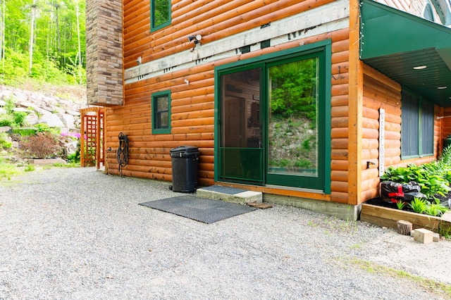 15 Doe Cir, Bingham, ME 04920 - view of exterior entry featuring log veneer siding