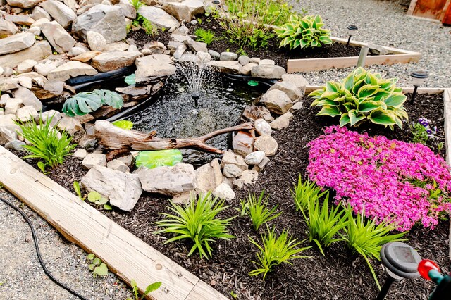 15 Doe Cir, Bingham, ME 04920 - exterior view of a garden pond