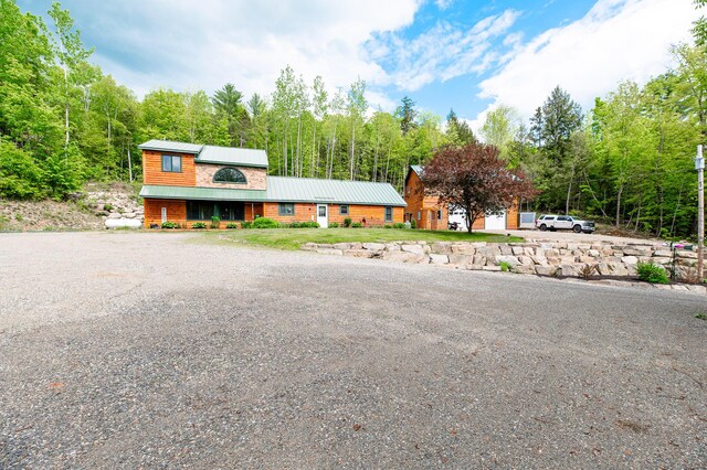 15 Doe Cir, Bingham, ME 04920 - view of front of home featuring metal roof