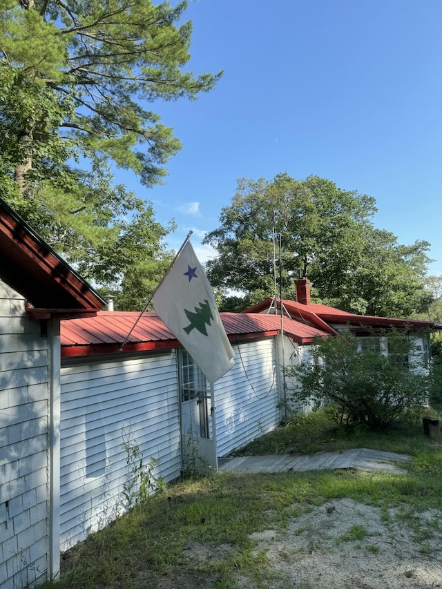 46 Arrowsic Rd, Arrowsic, ME 04530 - view of side of property with metal roof