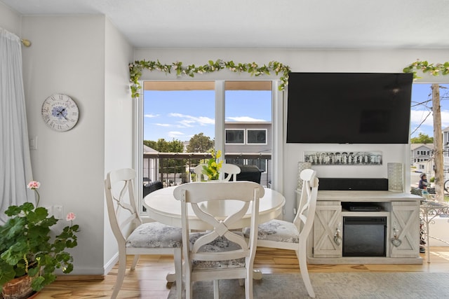 1 Seacliff Ave Unit 3D, Old Orchard Beach, ME 04064 - dining space with wood finished floors