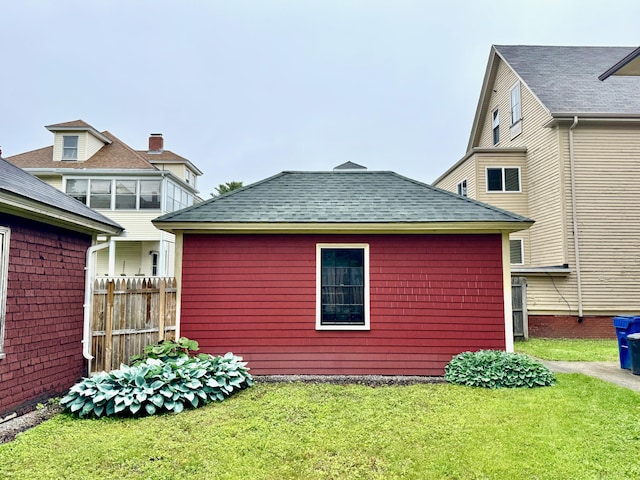 91 Washburn Ave, Portland, ME 04102 - view of side of home with a shingled roof
