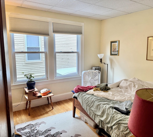 91 Washburn Ave, Portland, ME 04102 - bedroom with hardwood / wood-style floors and baseboards