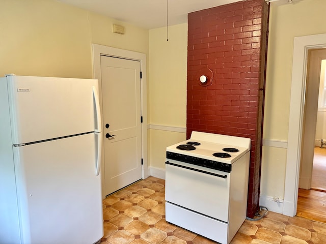 91 Washburn Ave, Portland, ME 04102 - kitchen featuring white appliances and light flooring