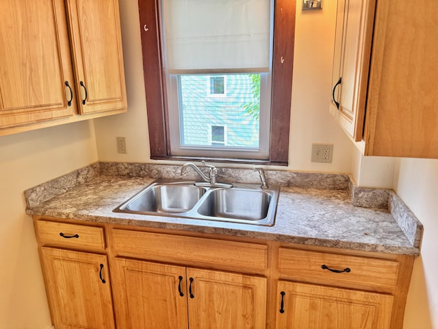 91 Washburn Ave, Portland, ME 04102 - kitchen featuring a sink and light countertops