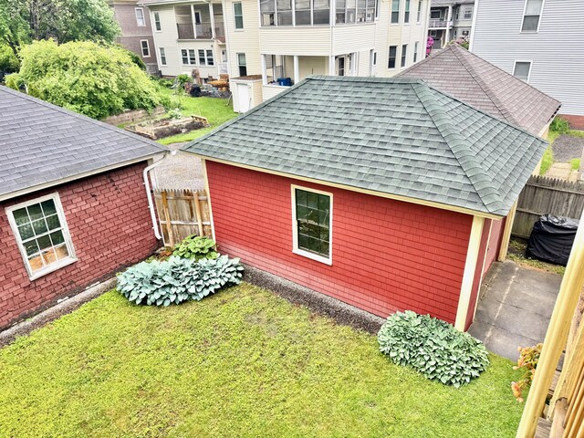 91 Washburn Ave, Portland, ME 04102 - view of side of home with a shingled roof