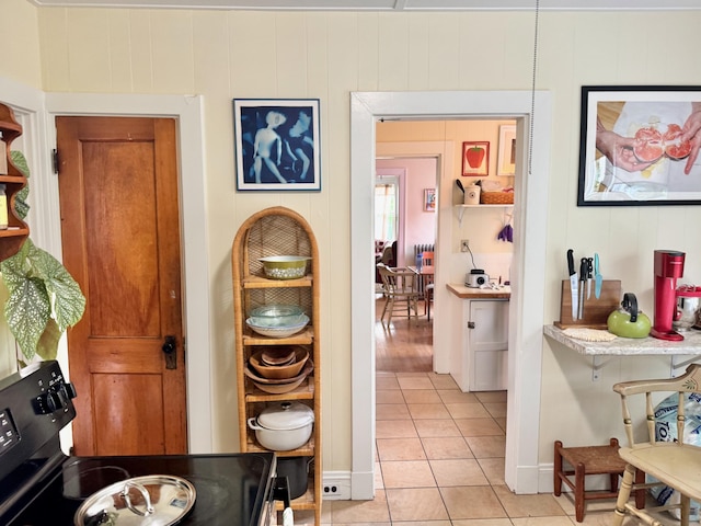 91 Washburn Ave, Portland, ME 04102 - hall with light tile patterned floors and baseboards