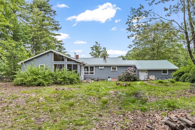 153 Shaker Rd, Gray, ME 04039 - back of house featuring a chimney and metal roof