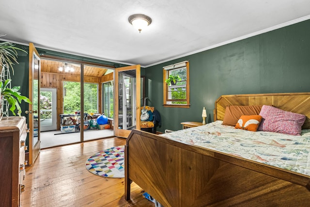 153 Shaker Rd, Gray, ME 04039 - bedroom featuring ornamental molding, access to outside, and wood-type flooring