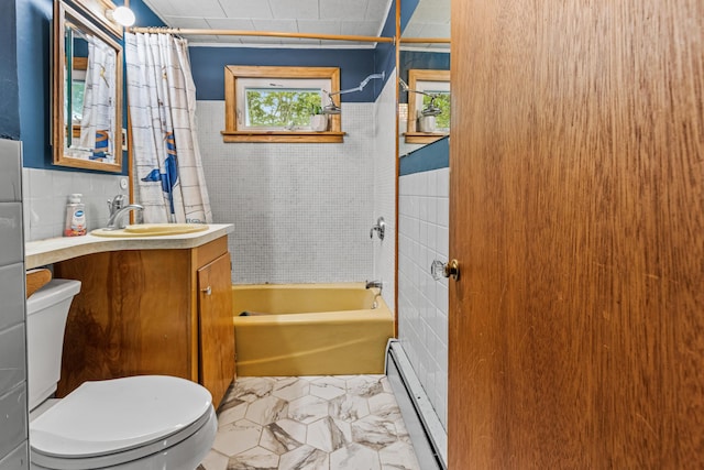 153 Shaker Rd, Gray, ME 04039 - bathroom featuring baseboard heating, toilet, vanity, marble look tile flooring, and tile walls