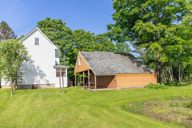 10 Joslyn St, Newport, ME 04953 - back of house with a yard and an outdoor structure