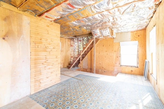 10 Joslyn St, Newport, ME 04953 - below grade area featuring stairs and wooden walls