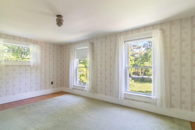 10 Joslyn St, Newport, ME 04953 - unfurnished room with plenty of natural light and baseboards
