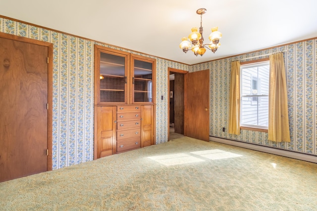 10 Joslyn St, Newport, ME 04953 - unfurnished bedroom with wallpapered walls, a chandelier, a baseboard heating unit, crown molding, and carpet floors