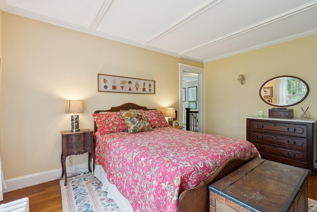7 Carroll Ave, Auburn, ME 04210 - bedroom featuring wood finished floors, baseboards, and ornamental molding