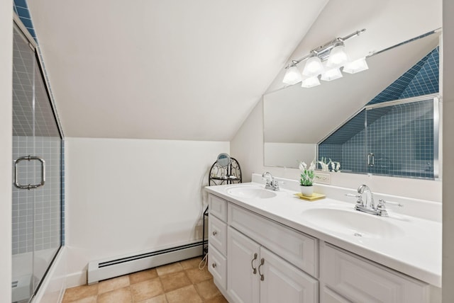 7 Carroll Ave, Auburn, ME 04210 - bathroom featuring baseboard heating, vaulted ceiling, a shower with door, double vanity, and a bath