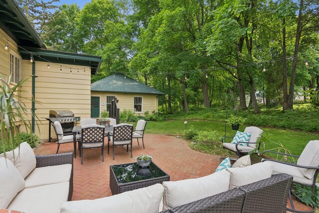 7 Carroll Ave, Auburn, ME 04210 - view of patio with an outdoor living space, outdoor dining area, and a grill