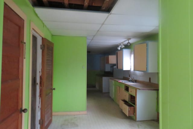 26 Walter St, Bangor, ME 04401 - kitchen with a sink, light countertops, and a paneled ceiling