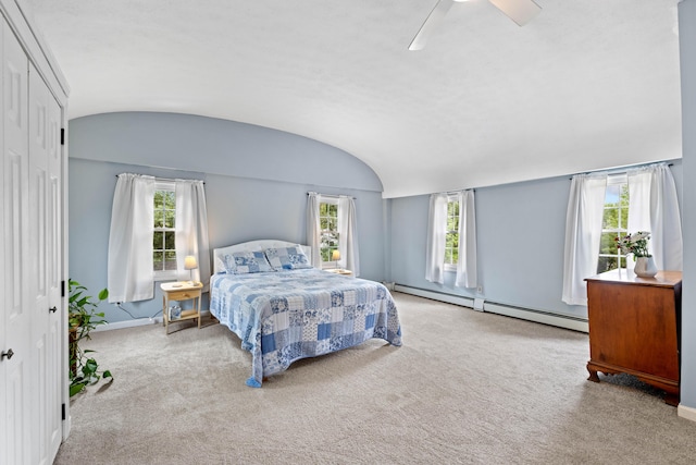 179 Alfred Rd, Kennebunk, ME 04043 - carpeted bedroom featuring baseboard heating, multiple windows, lofted ceiling, and a ceiling fan