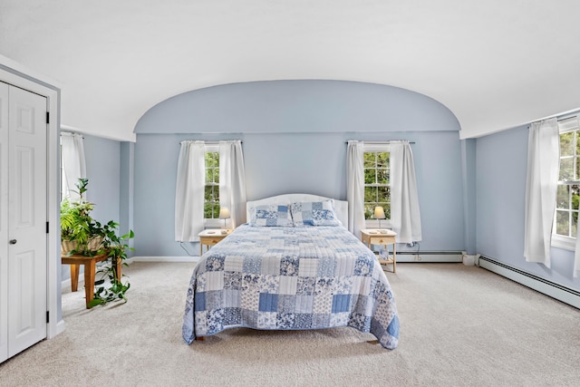 179 Alfred Rd, Kennebunk, ME 04043 - carpeted bedroom featuring a baseboard radiator and vaulted ceiling