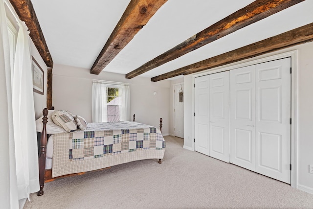 179 Alfred Rd, Kennebunk, ME 04043 - carpeted bedroom with beam ceiling and a closet