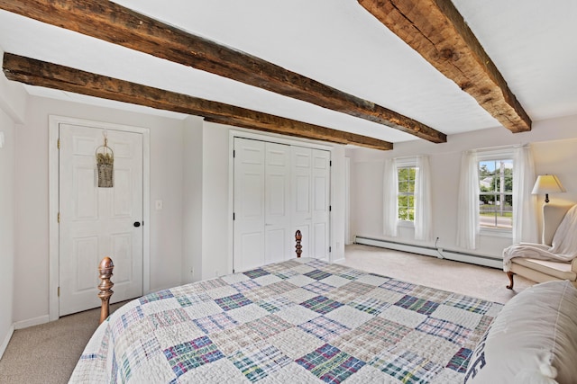 179 Alfred Rd, Kennebunk, ME 04043 - bedroom with a baseboard heating unit, light colored carpet, beamed ceiling, and a closet