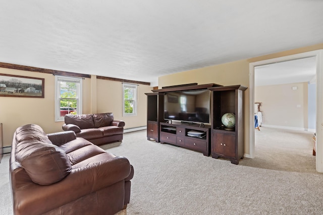 179 Alfred Rd, Kennebunk, ME 04043 - living room with a baseboard radiator and carpet