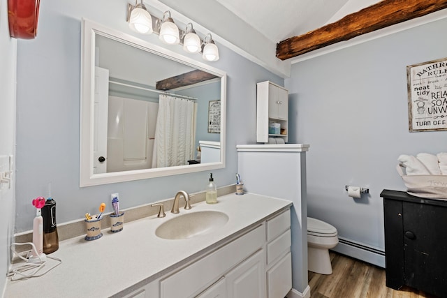 179 Alfred Rd, Kennebunk, ME 04043 - bathroom with a baseboard heating unit, vanity, wood finished floors, lofted ceiling, and a shower with shower curtain