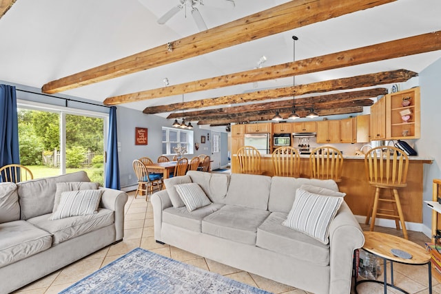 179 Alfred Rd, Kennebunk, ME 04043 - living area with ceiling fan, beamed ceiling, light tile patterned flooring, and a baseboard radiator