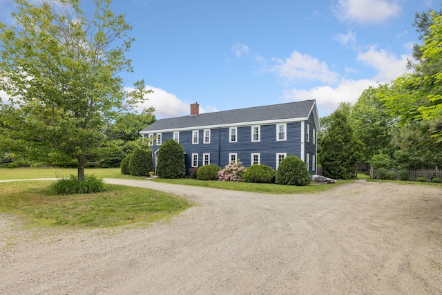 179 Alfred Rd, Kennebunk, ME 04043 - colonial-style house featuring a chimney and curved driveway