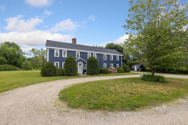 179 Alfred Rd, Kennebunk, ME 04043 - colonial home featuring curved driveway, a chimney, and a front lawn