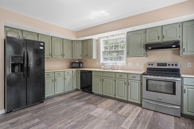20 Huntington Ln, Berwick, ME 03901 - kitchen featuring green cabinetry, black appliances, under cabinet range hood, and a sink