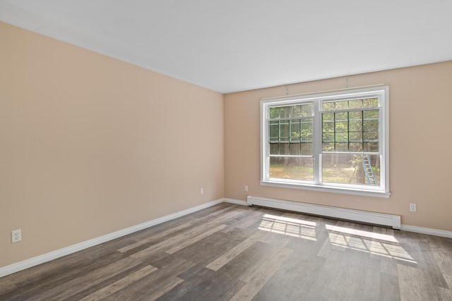 20 Huntington Ln, Berwick, ME 03901 - spare room featuring baseboard heating, baseboards, and wood finished floors