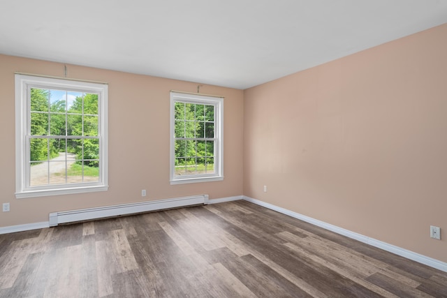 20 Huntington Ln, Berwick, ME 03901 - spare room with baseboard heating, wood finished floors, and baseboards