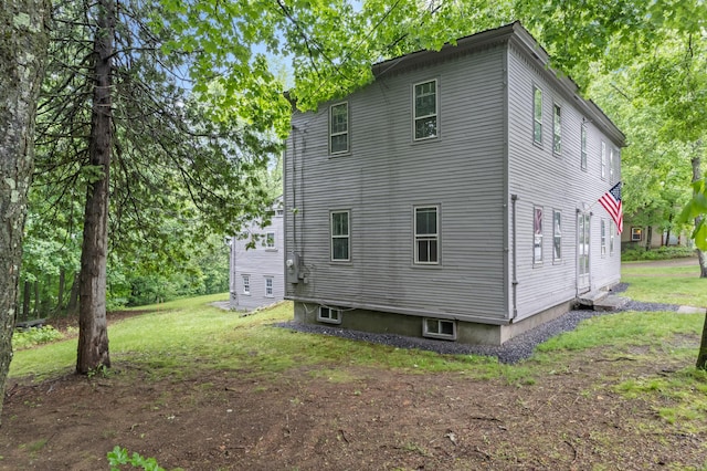 74 Main St, Cornish, ME 04020 - back of property featuring a lawn