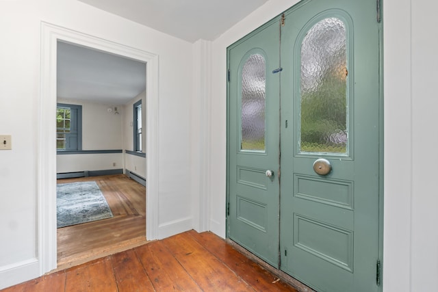 74 Main St, Cornish, ME 04020 - entryway featuring dark wood-type flooring, a baseboard radiator, and baseboards