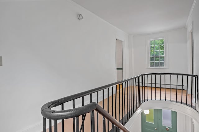 74 Main St, Cornish, ME 04020 - stairway with baseboards, crown molding, and a baseboard heating unit