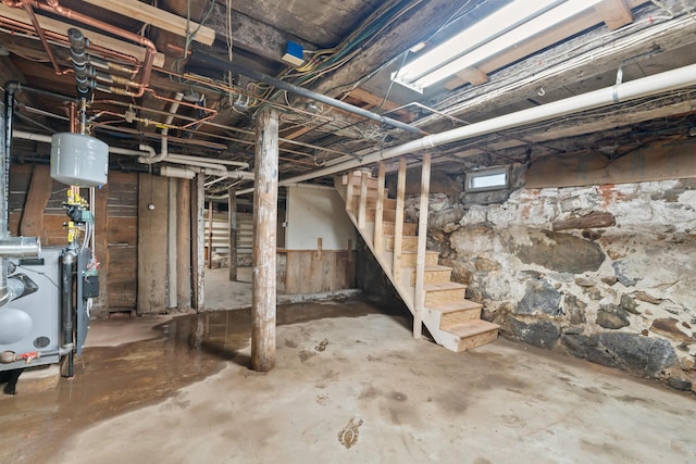 74 Main St, Cornish, ME 04020 - unfinished below grade area featuring stairs